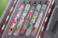 GoodSmile Moment Hatsune Miku: Racing Ver. 2025 Collectible Ribbon Keychain - Hatsune Miku - photo 1